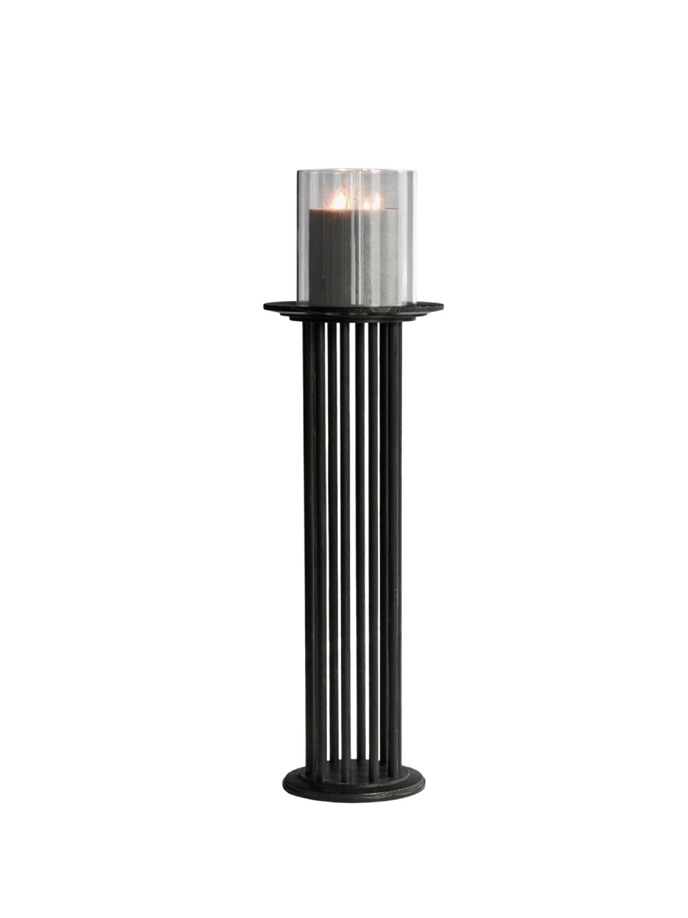 Black cylindrical outdoor light fixture with a glass cover ，The Column | Industrial Iron & Hand-Polished Wood Decorative Tall Candle Holder