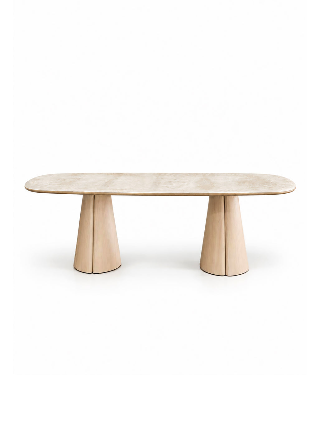 A modern oval dining table with a light beige wood grain top and two sculptural, flared pedestal legs, shown against a solid white background.
