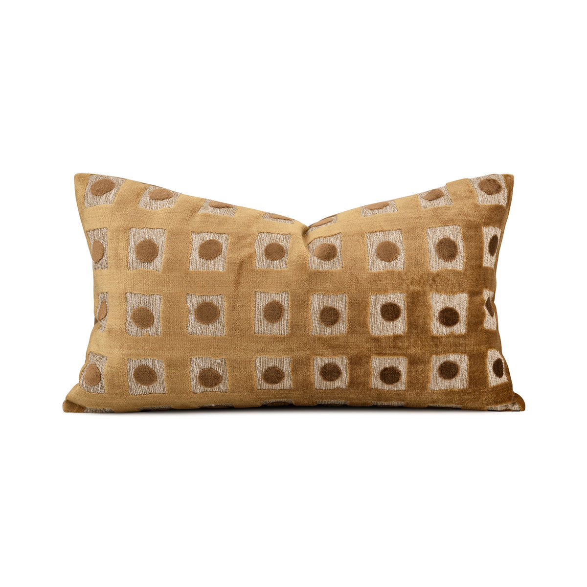 A rectangular throw pillow in a warm mustard-gold velvet fabric, featuring a woven geometric pattern of cream and brown squares with circular motifs, set against a plain white background.