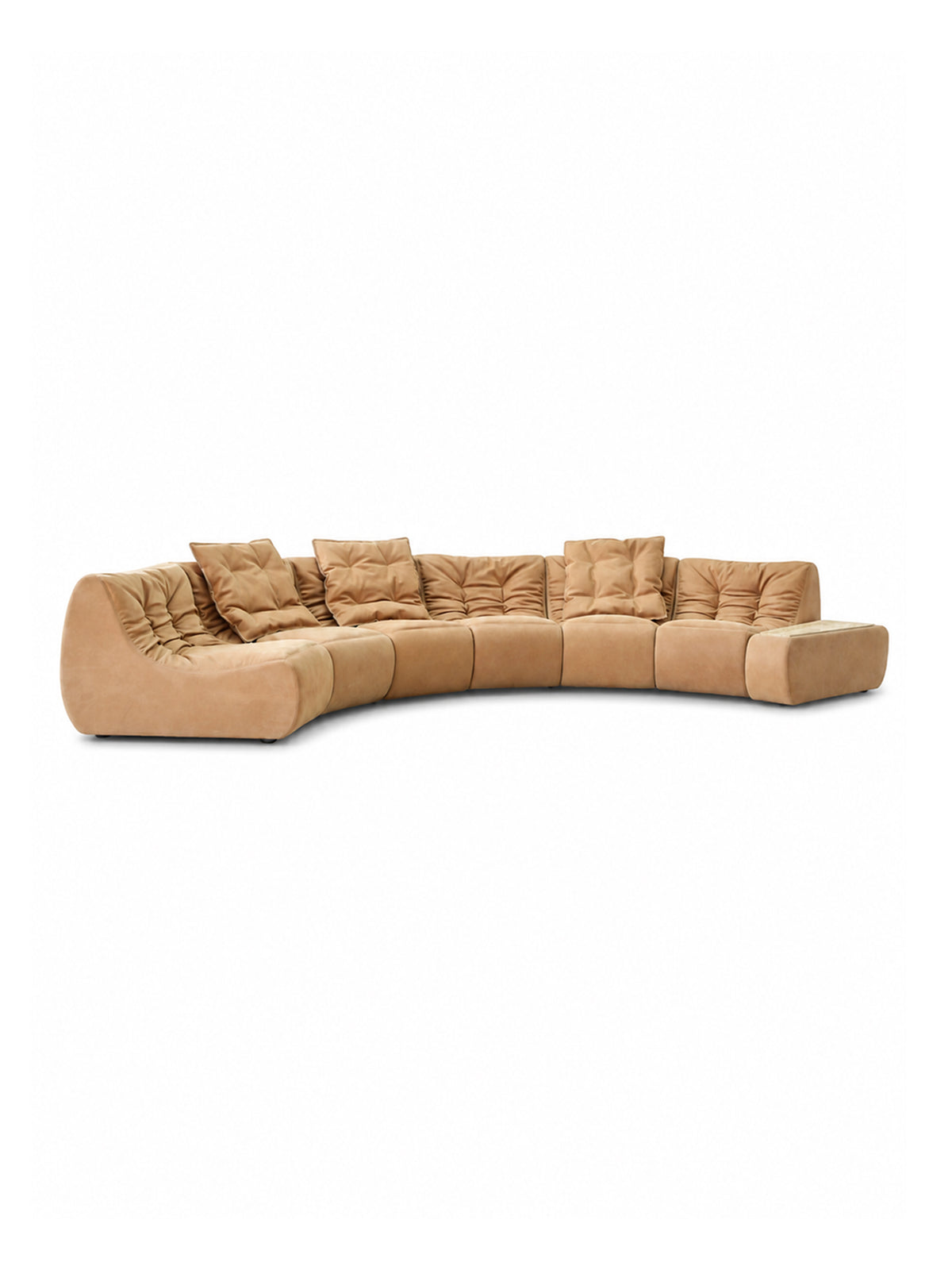 A curved modular sectional sofa upholstered in a warm tan suede-like fabric, featuring multiple tufted back cushions and matching throw pillows, Soft‑Hill modular curved leather sofa, segmented pleated bamboo‑texture backrest, sand‑wax genuine leather upholstery, organic‑modern quiet‑luxury large living‑room furniture with detachable marble‑top storage module.