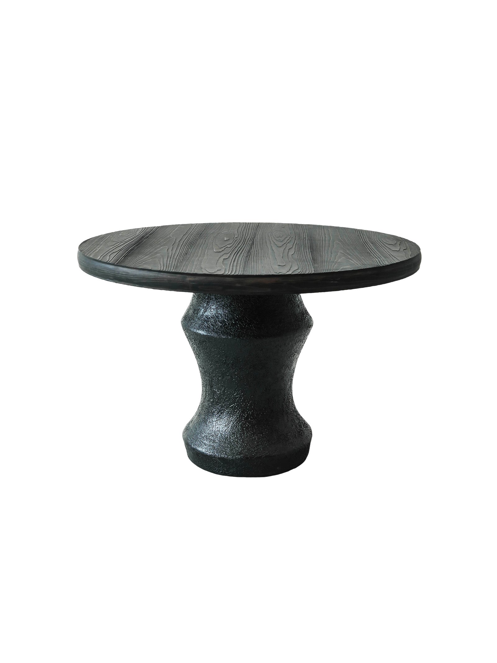 Pine Haven sculptural dining table with charred cedar wood top and textured fiberglass base, organic modern statement piece for luxury interiors.Premium quiet luxury round dining table with charred cedar finish, ideal for contemporary dining rooms and boutique hotel spaces.