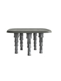 Modern gray dining table with unique cylindrical legs，Premium quiet luxury coffee table with sculptural ceramic legs and oak frame, ideal for contemporary living rooms and hotel lobbies.
